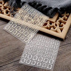 Detail of gold and silver metallic snake nail art stickers showing model TH-1026 and TH-1031