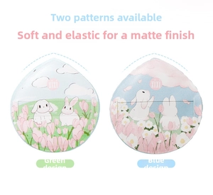 Detailed view of teardrop cushion puffs featuring green rabbit and blue tulip patterns
