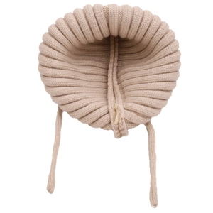 Beige ribbed knit baby hat with ear flaps and chin ties for winter warmth
