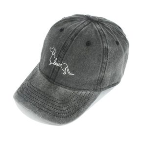 Close-up of embroidered white dog and love text on dark grey washed cotton baseball cap