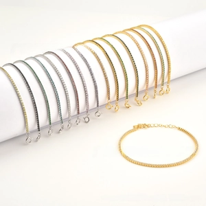 Detailed array of S925 silver tennis bracelets with colorful zircons on white props
