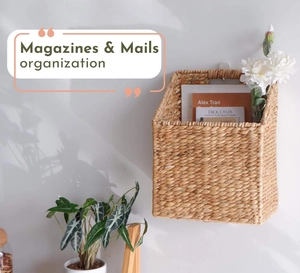 Detail of handwoven rattan wall basket for magazines and mails against a white wall