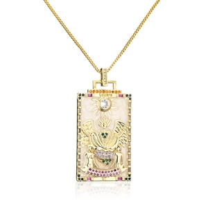 Detail of 18K gold plated Tarot Lovers pendant with enamel and multi-colored zircons