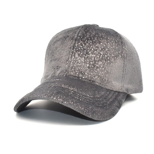 Close-up of a grey sparkly sequined baseball cap with warm fuzzy texture for winter