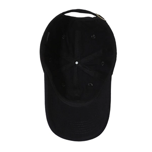 Inside view of black cotton baseball cap showing internal seams and metal buckle