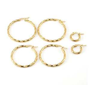 Three pairs of golden twisted hoop earrings in small medium and large sizes