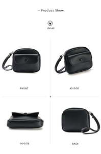 Detailed views of a black litchi pattern leather wristlet purse with multiple compartments