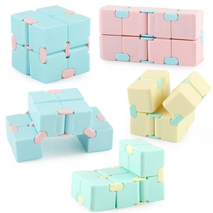 Infinite Cube stress relief toy set in macaron colors showing various folding states