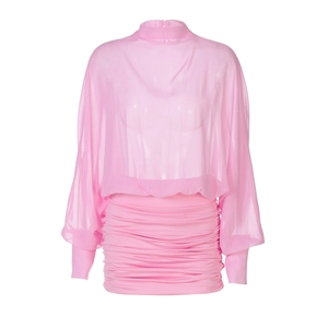 Detail of pink chiffon long sleeve top with pleated bodycon skirt showing fabric texture