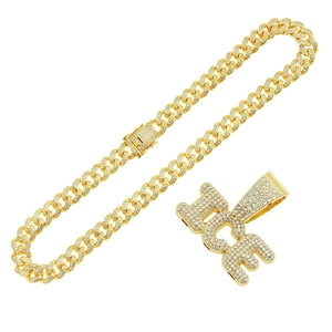 Iced-out gold Cuban link chain necklace with sparkling crystal ICE letter pendant