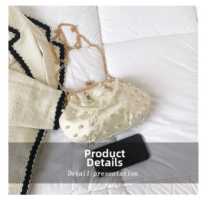 Detailed comparison showing standard smartphone fitting inside white pearl shell clutch bag