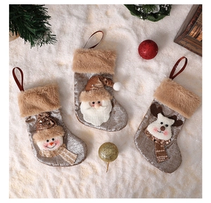 Three-piece Christmas stockings set with silver sequins and reindeer snowman patterns