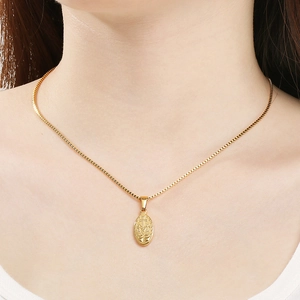 Detail of 18K gold plated square box chain and oval religious portrait pendant necklace