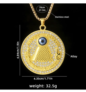 Detail view of gold pyramid evil eye necklace with dimensions 4.84x4.35cm and 70cm chain
