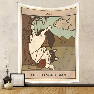 Detail of bohemian cat tarot tapestry featuring the XII Hanged Man design on textured wall