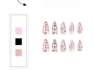 Detail view of almond press-on nails featuring Y2K aurora patterns and eye totem designs