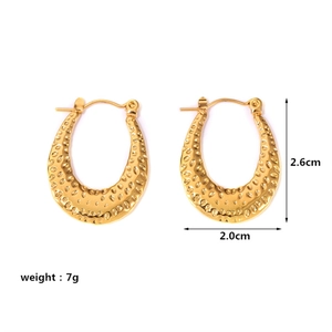 Detail view showing hammered texture and dimensions of gold stainless steel hoop earrings