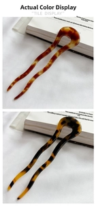 Detail view of wavy acetate U-shaped hair pins in tortoise shell and tiger stripe finishes