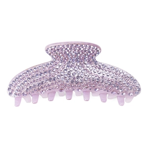 Detailed macro view of large lilac acrylic claw clip with shimmering rhinestones inlay
