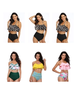 Detail of high waisted bikini sets with ruffled tops in floral and leopard prints