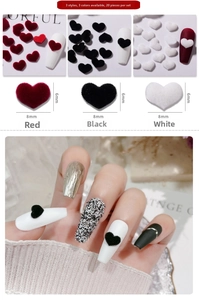 Detailed view of 8mm velvet flocking heart nail charms in red, black and white colors