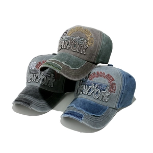 Vintage washed baseball caps with New York embroidery and distressed brim details