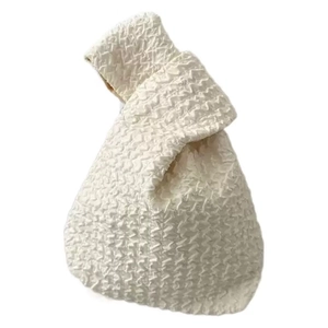 Minimalist Japanese cream popcorn fabric knotted wrist bag with embossed texture finish