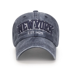 Vintage washed navy blue baseball cap featuring 3D New York embroidery and a curved brim