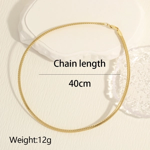 Detailed close-up of 18K gold-plated snake bone chain necklace, 40cm length and 12g weight