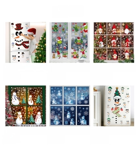 Various Christmas window stickers featuring snowman, gnomes, and festive patterns