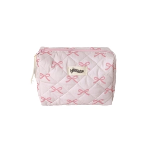 Pink quilted makeup bag with bow pattern and zipper closure for cosmetics storage