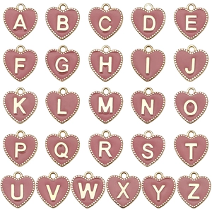 Grid of pink enamel heart charms with gold A-Z alphabet letters for DIY jewelry making
