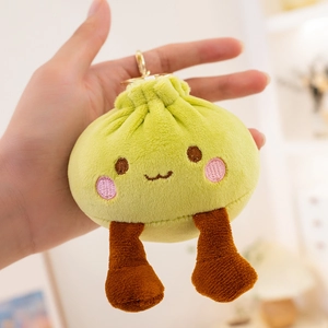 Cute green dumpling plush keychain with cute embroidery and small brown legs