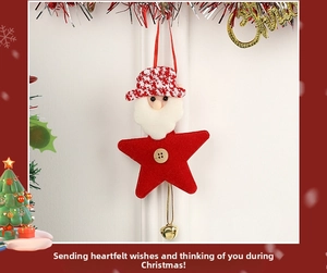 Detail of red felt star ornament with Santa head, knit hat, and small golden bell charm