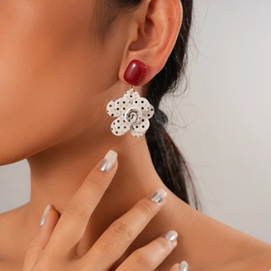 Elegant six-piece acrylic floral drop earrings featuring red rectangular studs and patterns