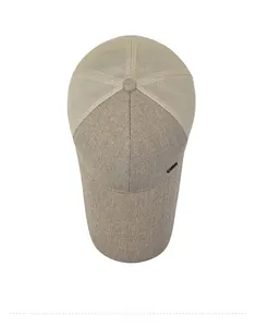 Top view of men's beige baseball cap showing breathable mesh and canvas texture