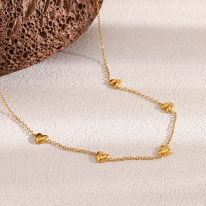 Detail of 18K gold plated stainless steel O-chain with 3D heart-shaped bead pendants