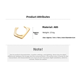 Detail view of irregular golden geometric cuff bracelet with material and size specifications