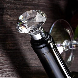 Elegant diamond-shaped crystal wine bottle stopper with secure rubber seal and silver base