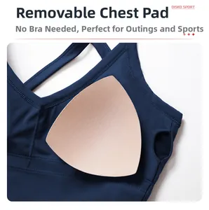 Detail of navy blue sports dress showing V-neck design and removable padded cups