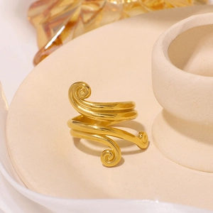 Polished gold stainless steel open ring featuring a unique curved geometric wrap design