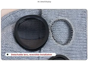 Detail of the detachable dark lenses and circular black frames on the gray knit winter hat