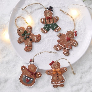 Set of 5 gingerbread man Christmas tree ornaments with festive resin textures and ropes