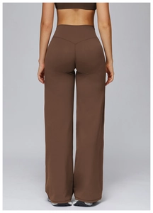 Rear view of high-waisted dark brown wide-leg yoga pants showing slimming lifting effect