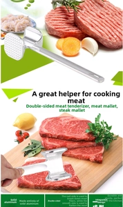 Close-up of double-sided meat tenderizer with textured surface and ergonomic handle