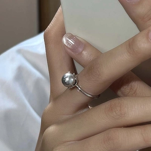 Minimalist S925 sterling silver ring with a large grey pearl on a polished silver band