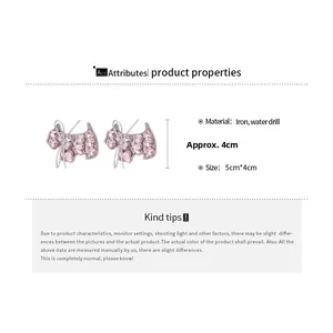 Detailed specs of pink rhinestone puppy hair clip with iron material and 5cm x 4cm size