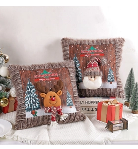 Detail of Christmas pillowcase featuring 3D Santa and Reindeer dolls with plush edges