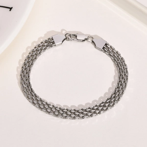 Detail of silver multi-strand mesh chain bracelet with a lobster clasp in stainless steel