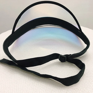 Detail of adjustable black strap and iridescent PVC visor on this sun protection hat